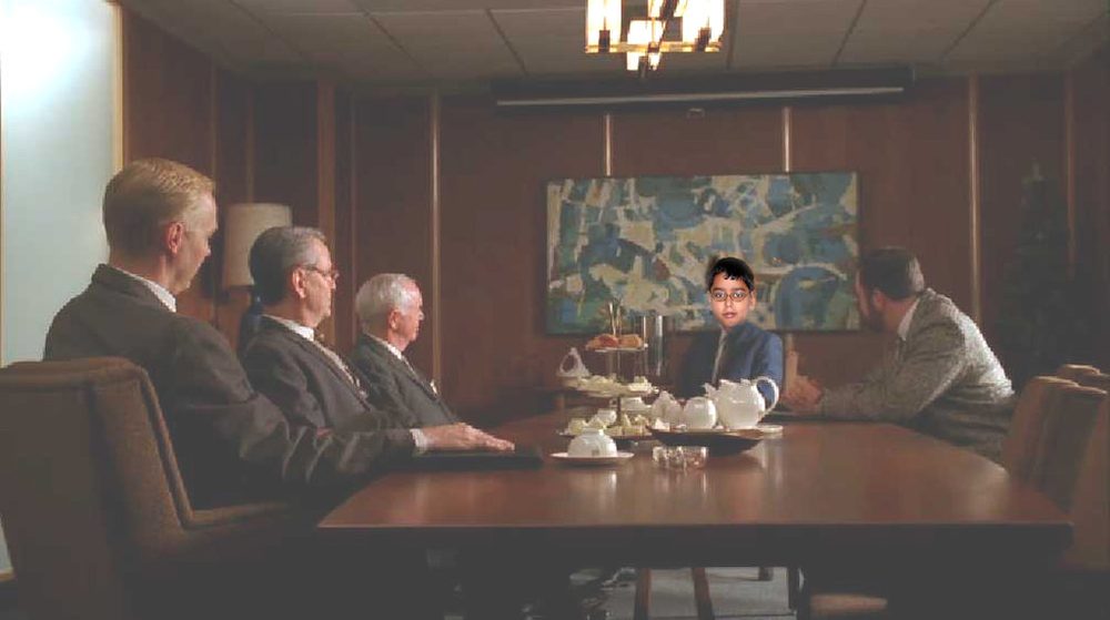 People around a meeting table