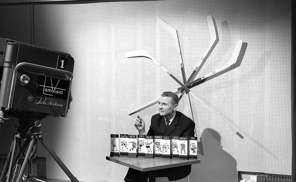 A television camera in a mid-century studio